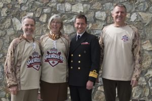 ET2016-0075-01 The Honourable Judith Guichon, Lieutenant Governor of British Columbia, is greeted by LGen (Retd) Kent Foster, RAdm Gilles Couturier, Commander MARPAC and HHC Founder Glenn Cumyn at the pre-game reception on 6 March 2016.